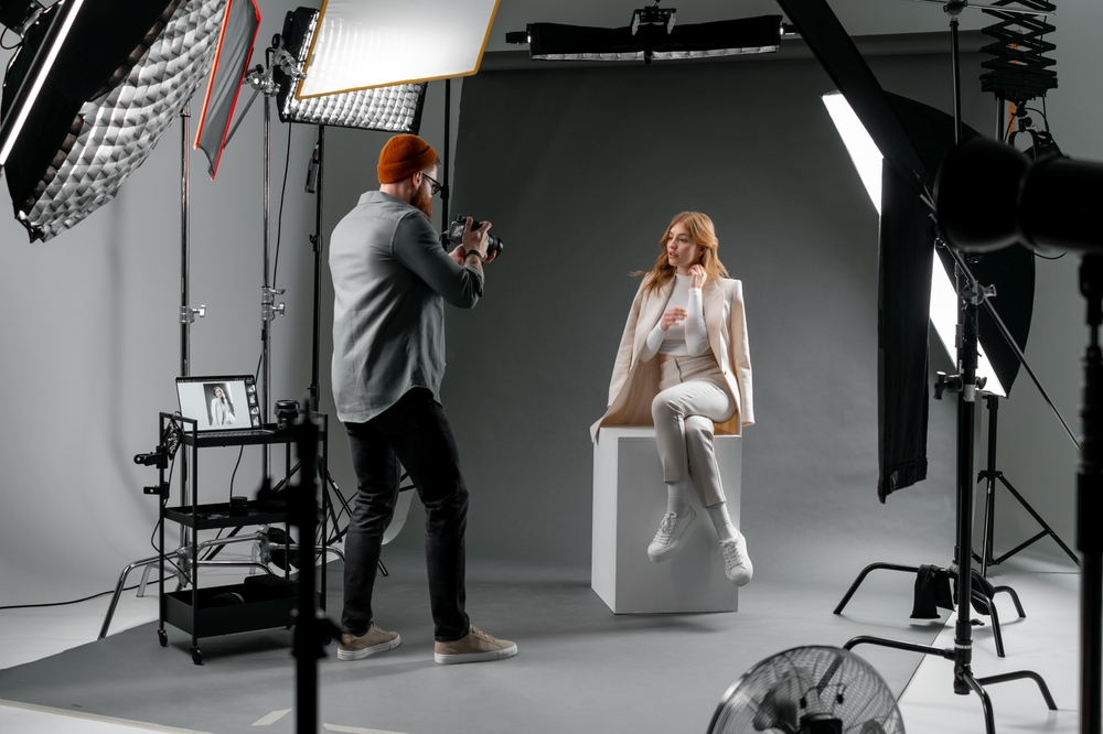 Photographer,And,Fashion,Model,In,Studio,For,Creative,Art,,Clothes