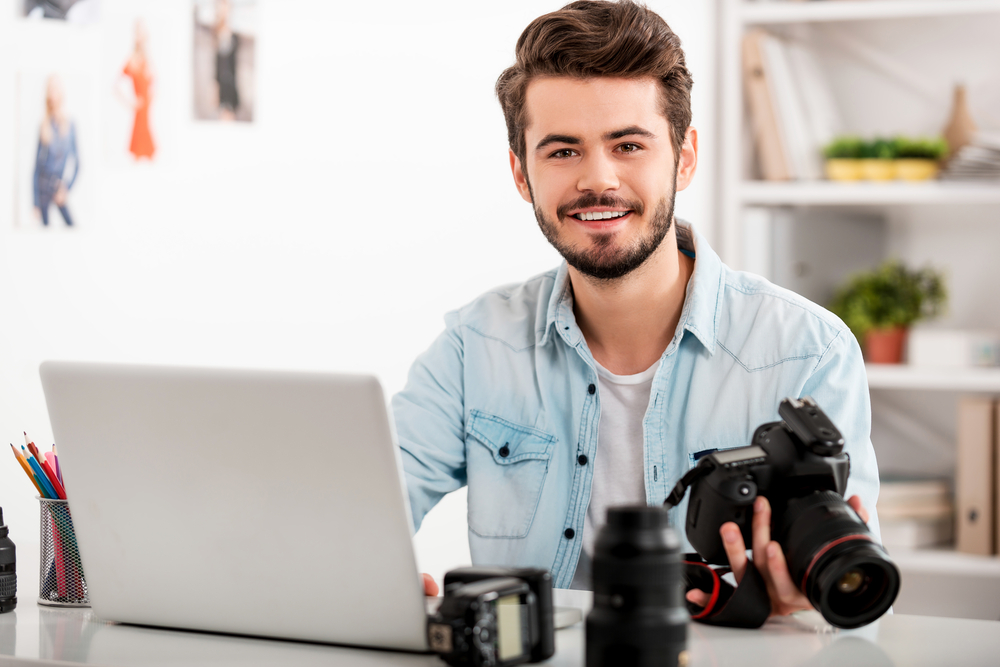 My,Job,Is,My,Passion.,Handsome,Young,Man,Holding,Camera